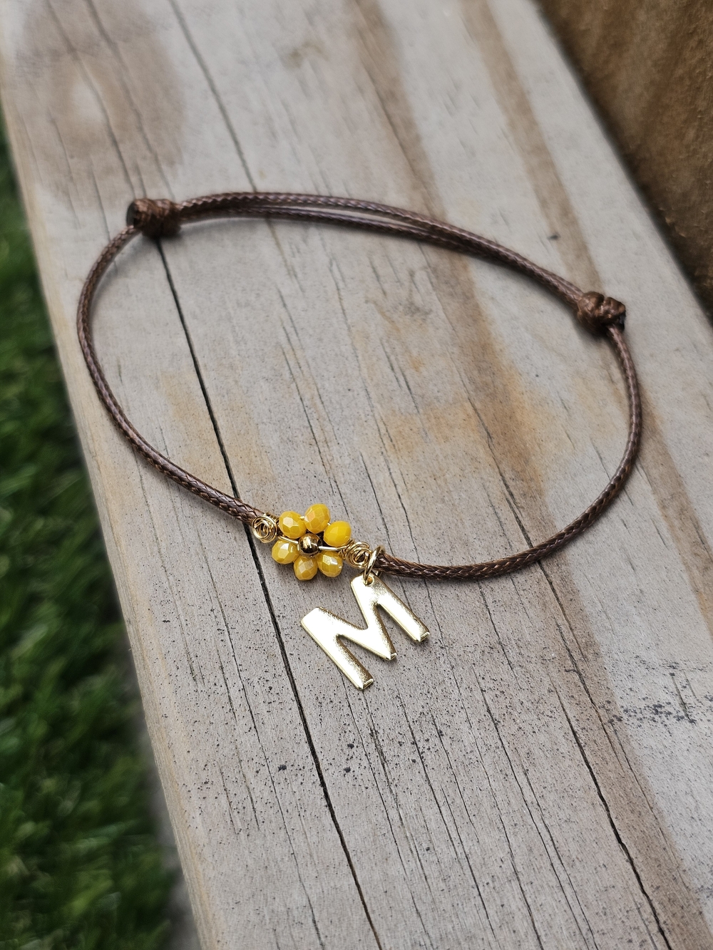 Personalized Gold 'M' Bracelet with Yellow Flower Bead Accent